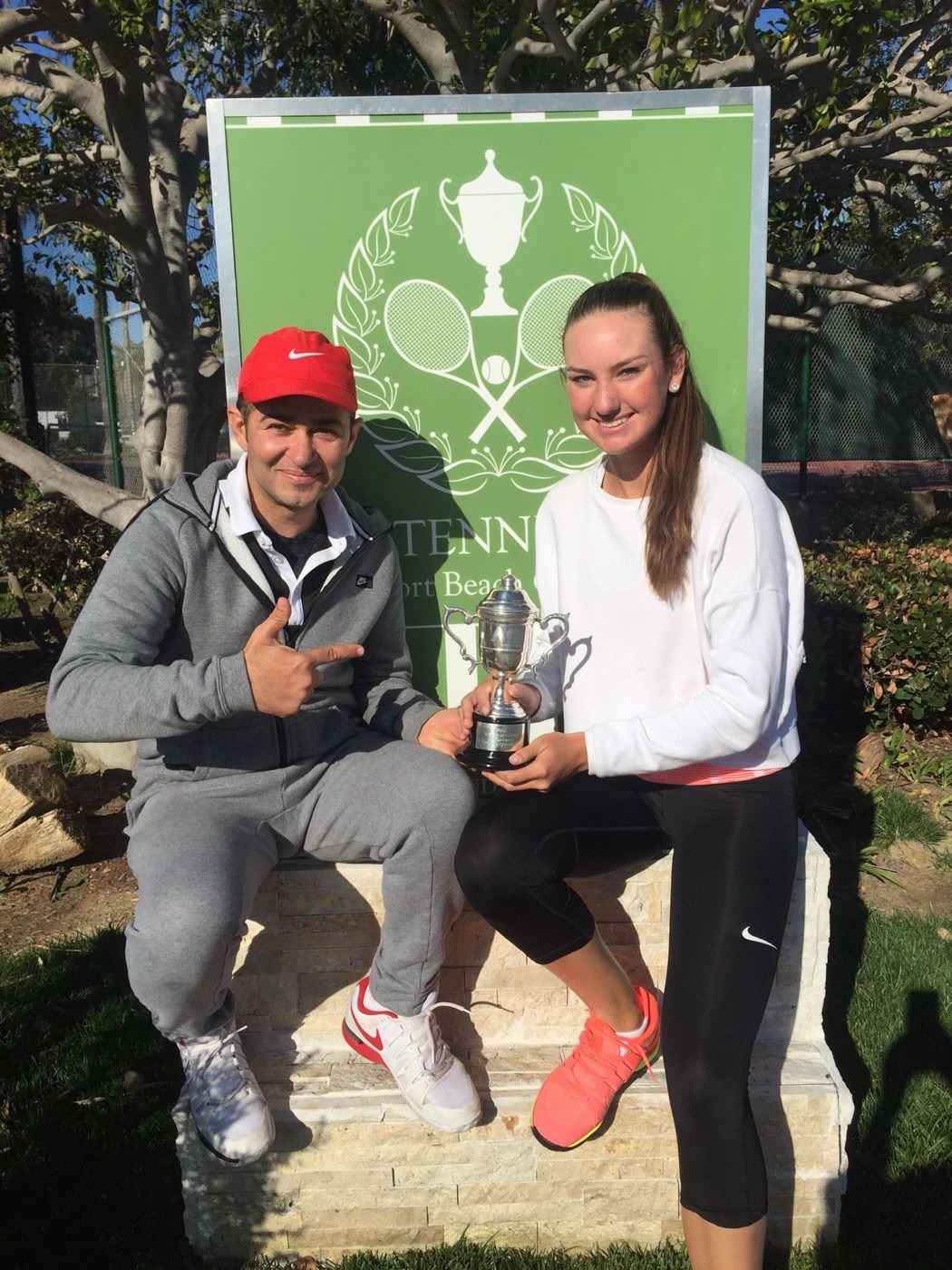 Carson Branstine with Sean Bollettieri and a trophy at the club