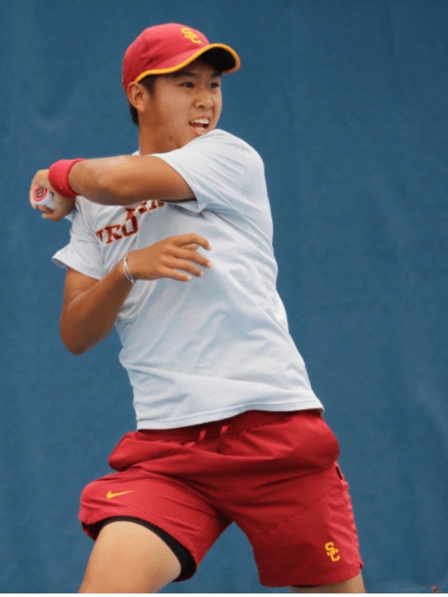 Lerner Tien striking a backhand